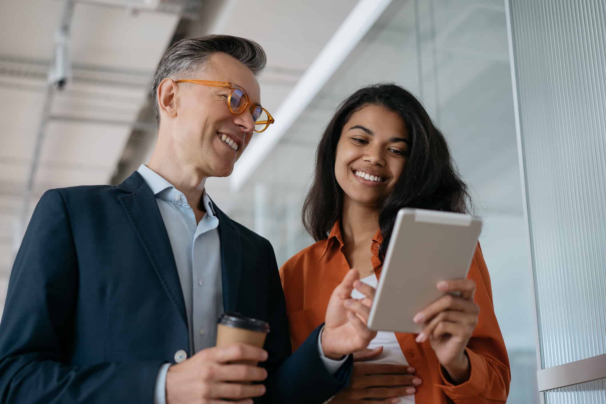 two employees using tablet