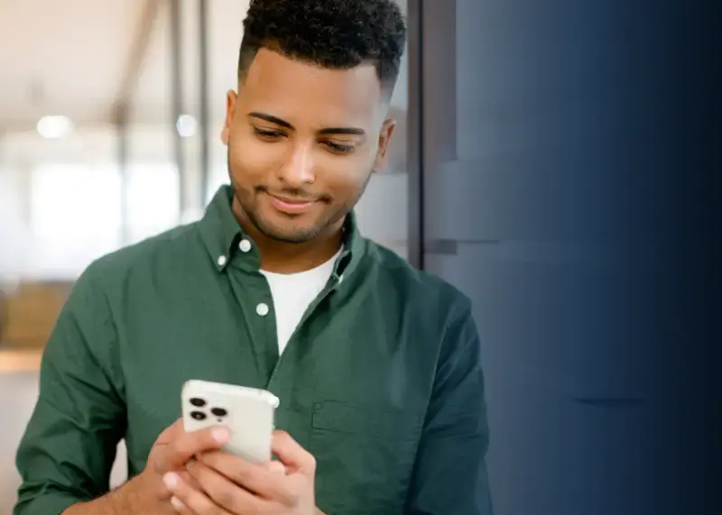 happy employee using phone in office