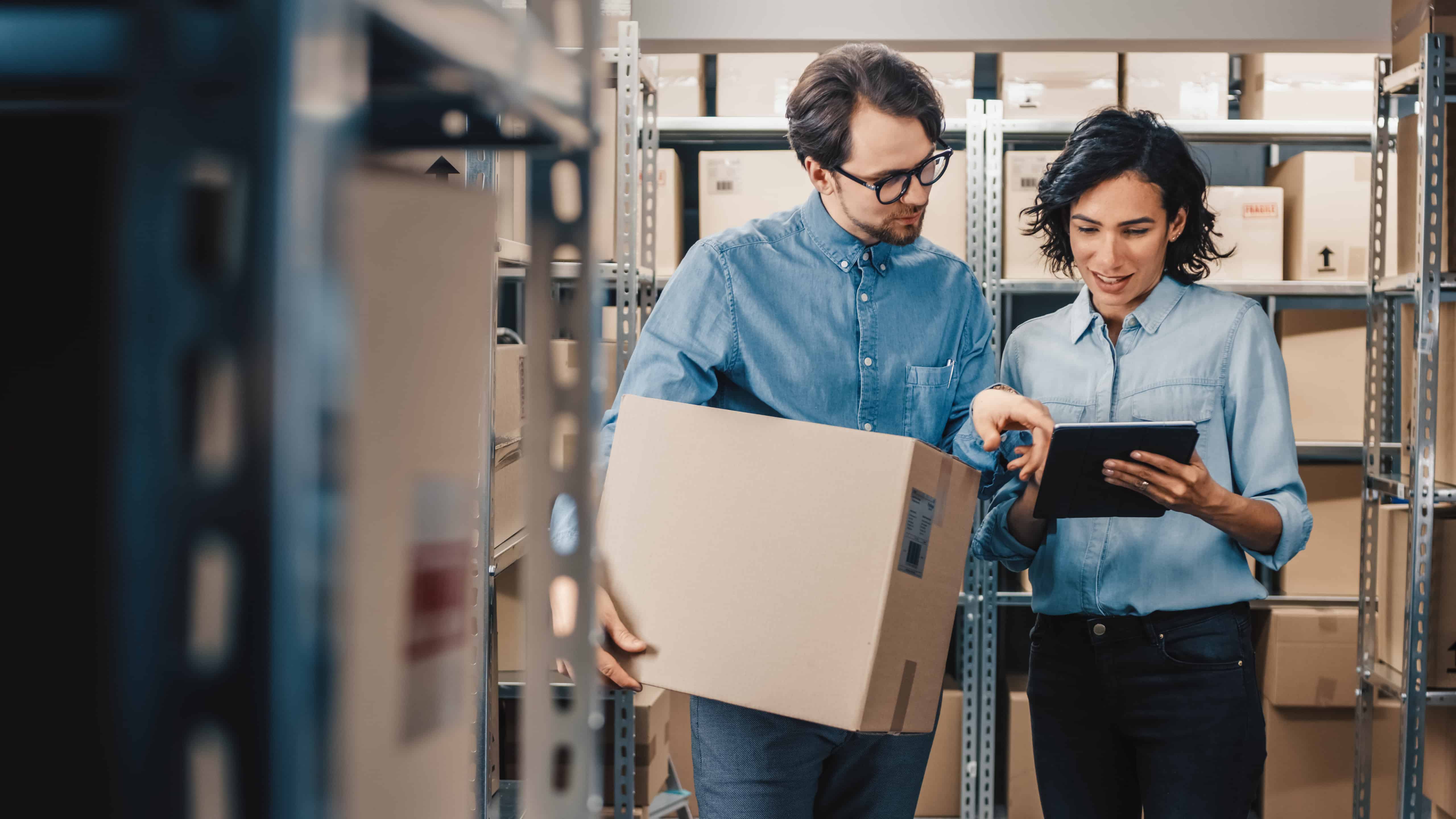 Employees preparing gifts to be delivered as part of Amazon's crowdfunded wishlists.