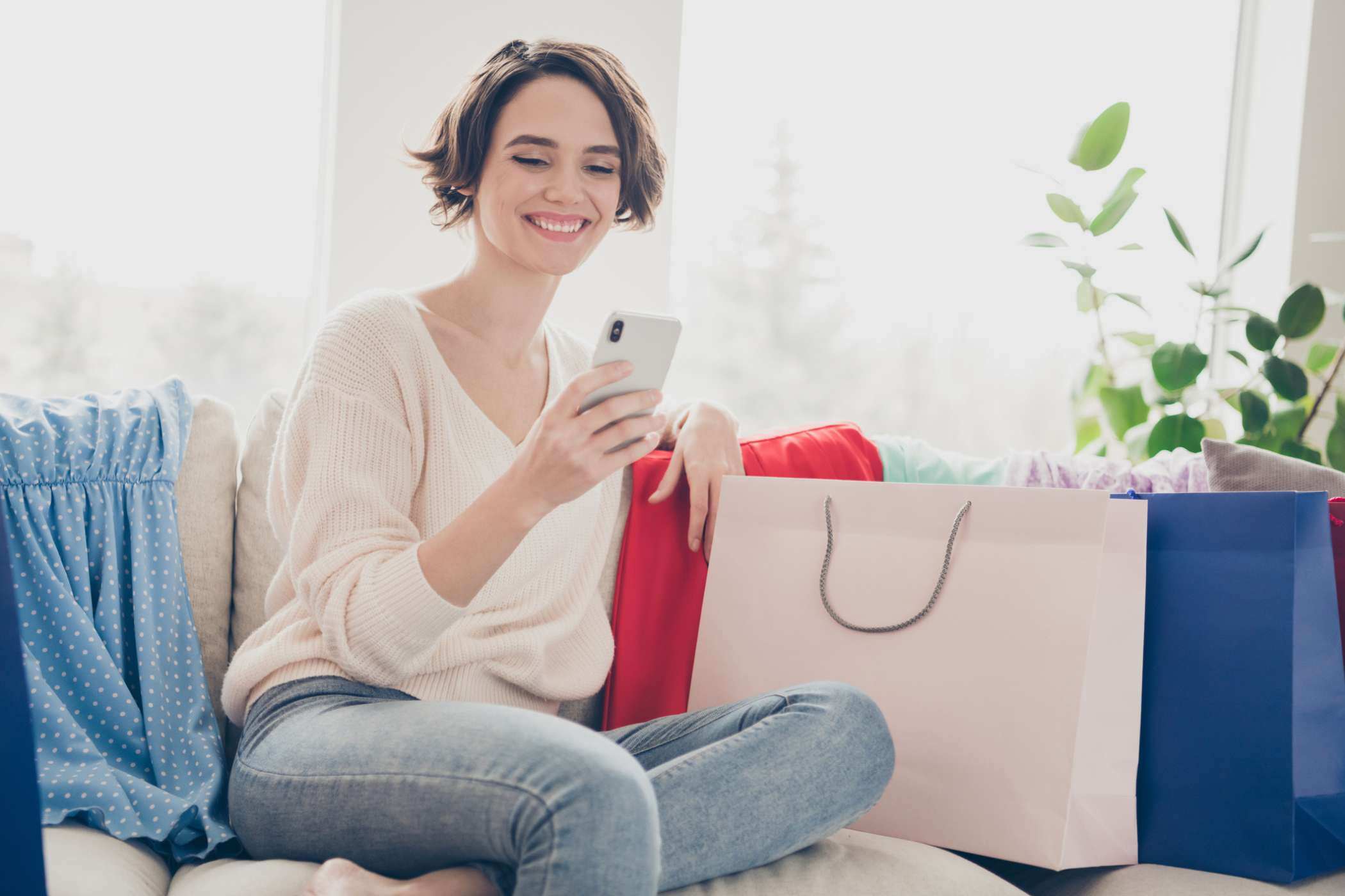 recipient viewing an closed loop reward on her phone after shopping